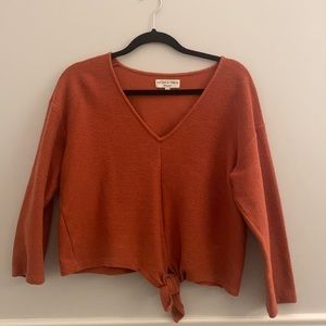Ribbed burnt orange Madewell blouse.